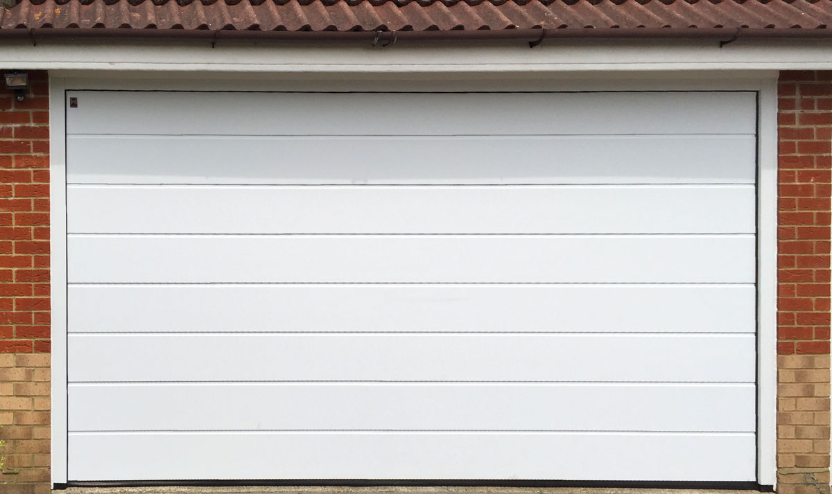 Access Garage Doors Hormann LPU42 L Ribbed Garage Door in Golden Oak