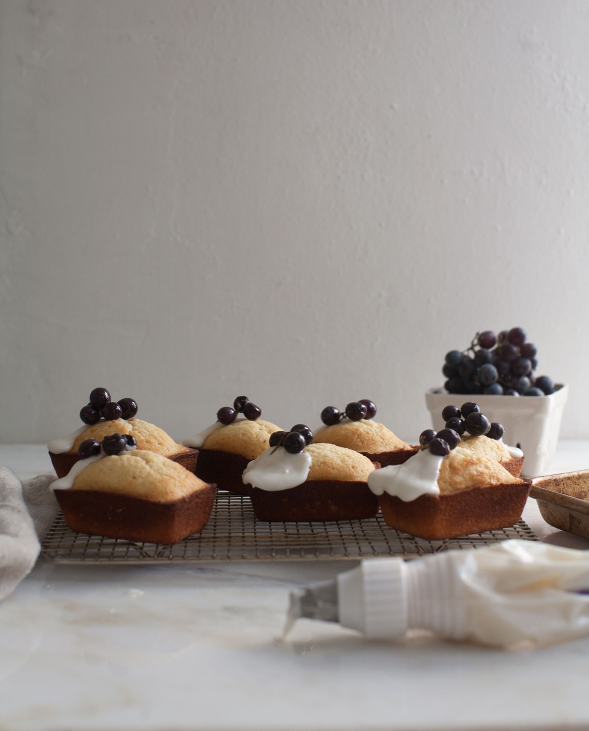 Mini Vanilla Pound Cakes with Labneh Frosting and Roasted Grapes A