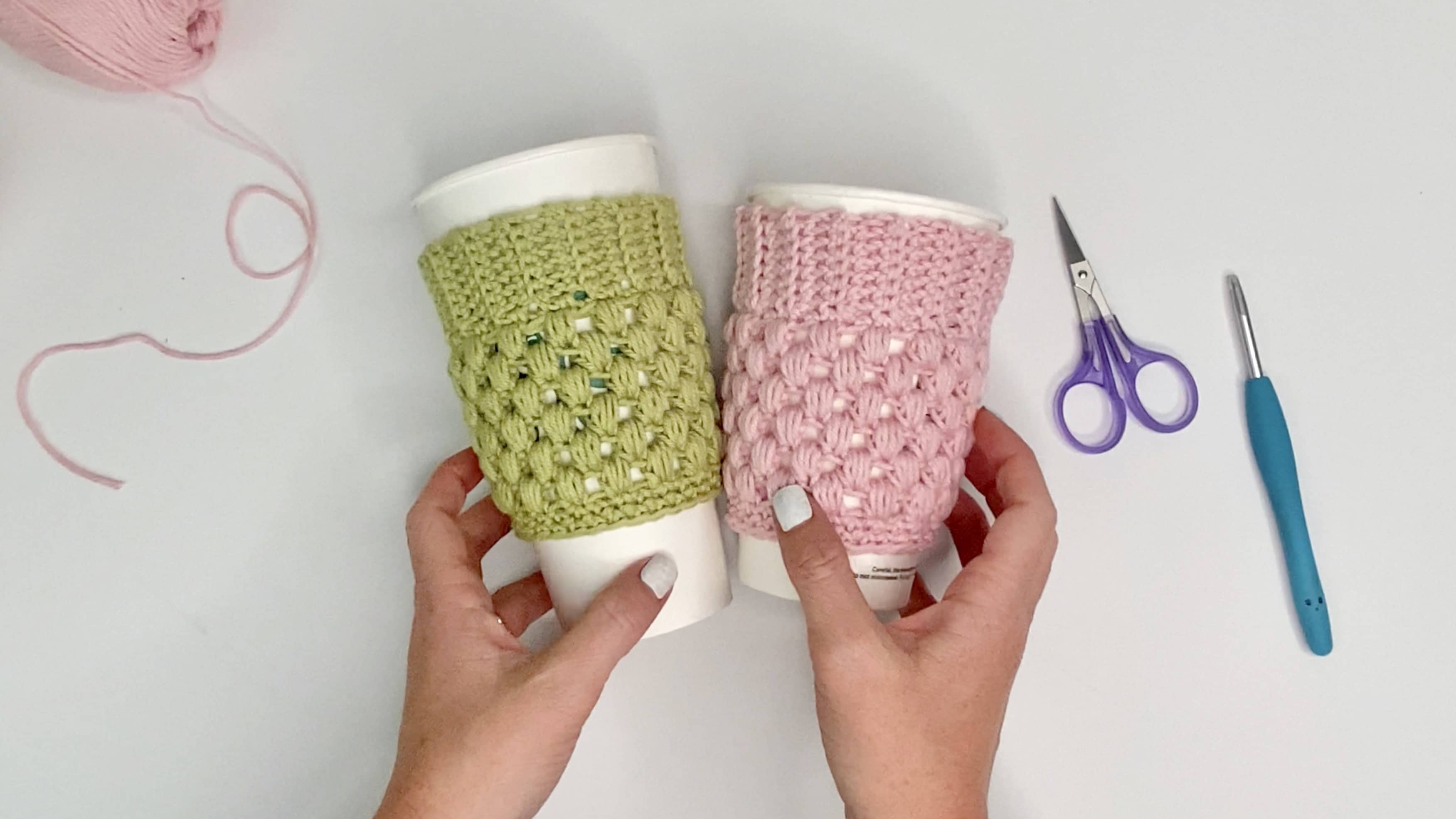 Learn how to make an easy crochet coffee cup cozy with 100% cotton yarn and replace one-time use coffee sleeves. Includes a full video tutorial. 