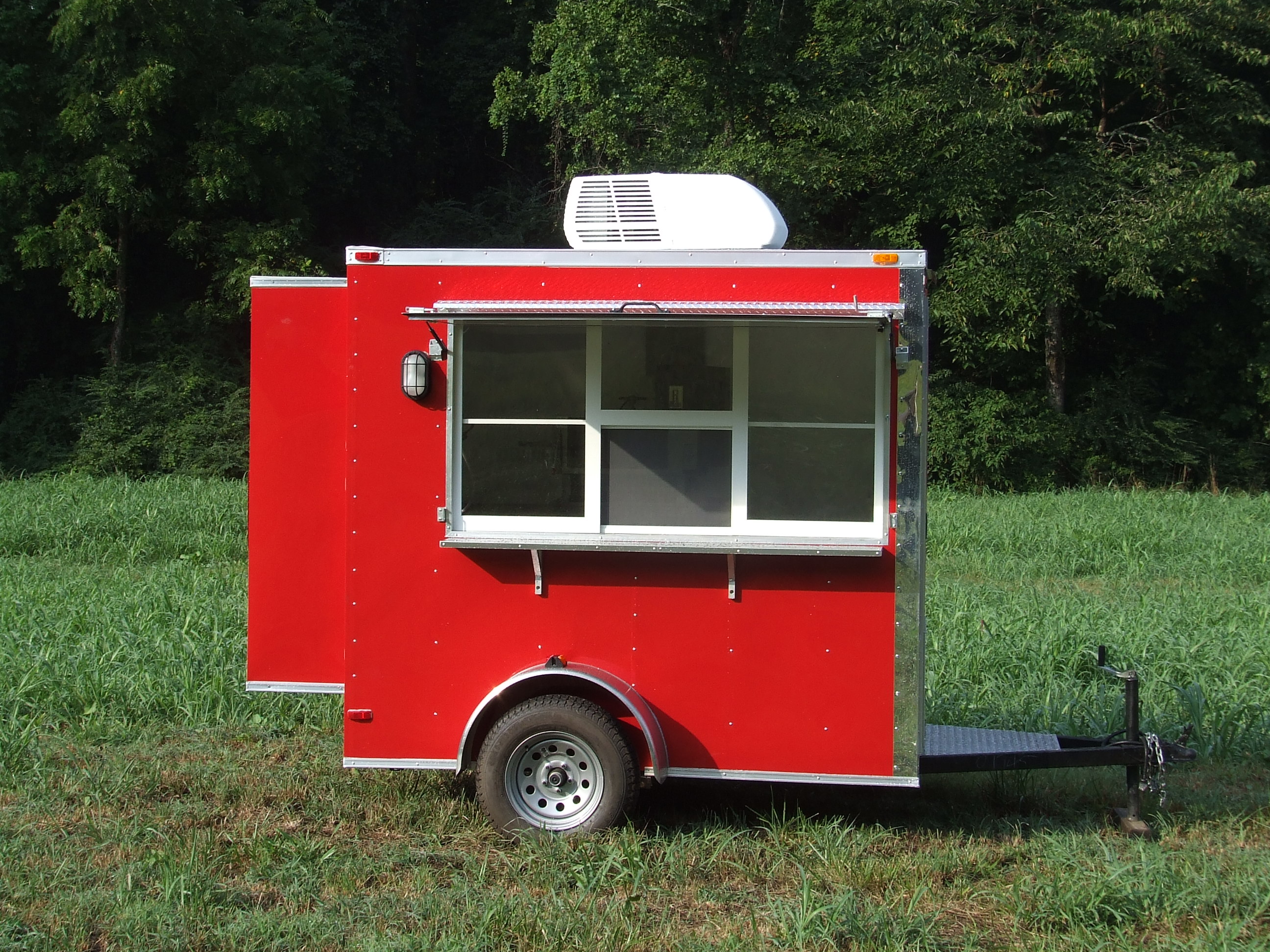 Red Concession Trailer with Bump Outs Advanced Concession Trailers