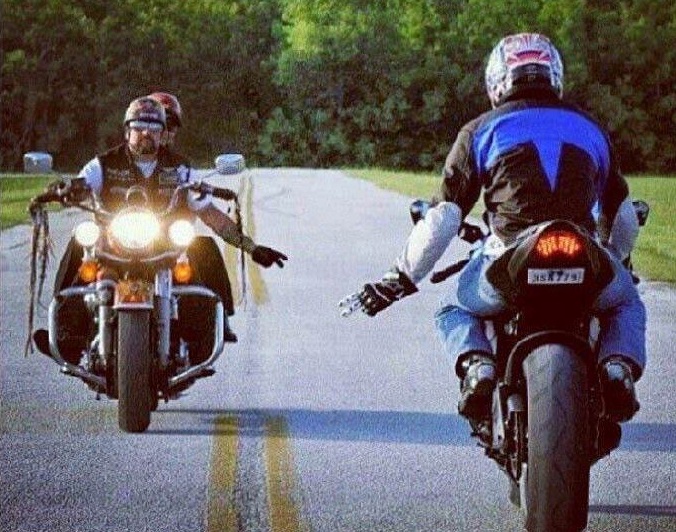Rider etiquette do you gesture to other bikers when riding?