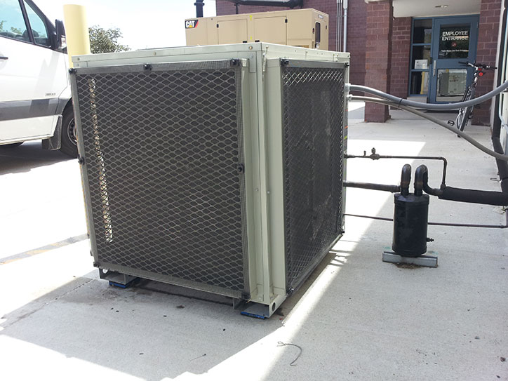 Rooftop Unit Filter Screen Over Steel Hail Guards. Air Solution Company