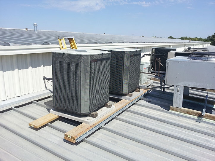 Rooftop Unit Filter Screen Over Steel Hail Guards. Air Solution Company