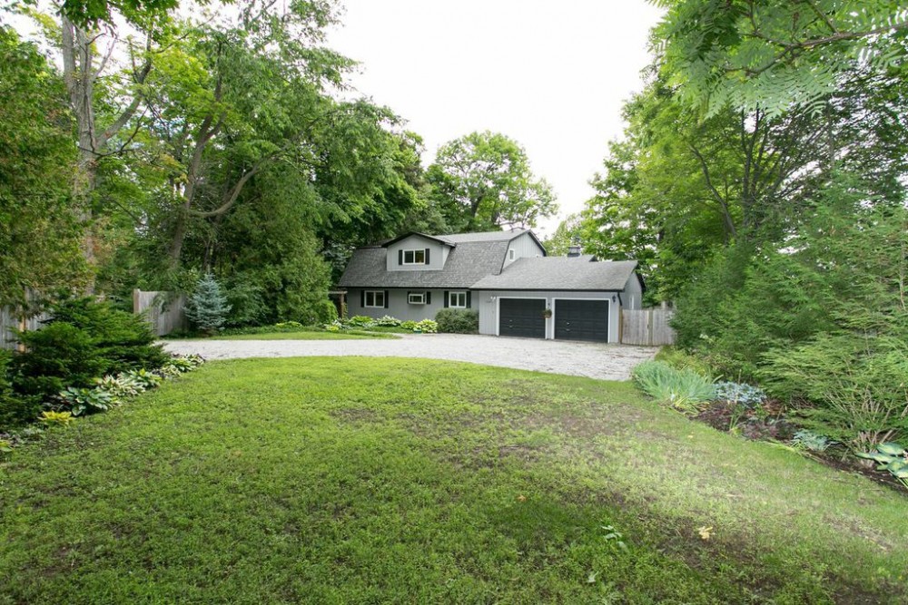 Waterfront Home or Cottage with 65 ft of Shoreline on Beautiful Lake