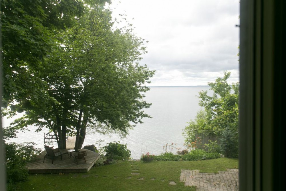 Waterfront Home or Cottage with 65 ft of Shoreline on Beautiful Lake