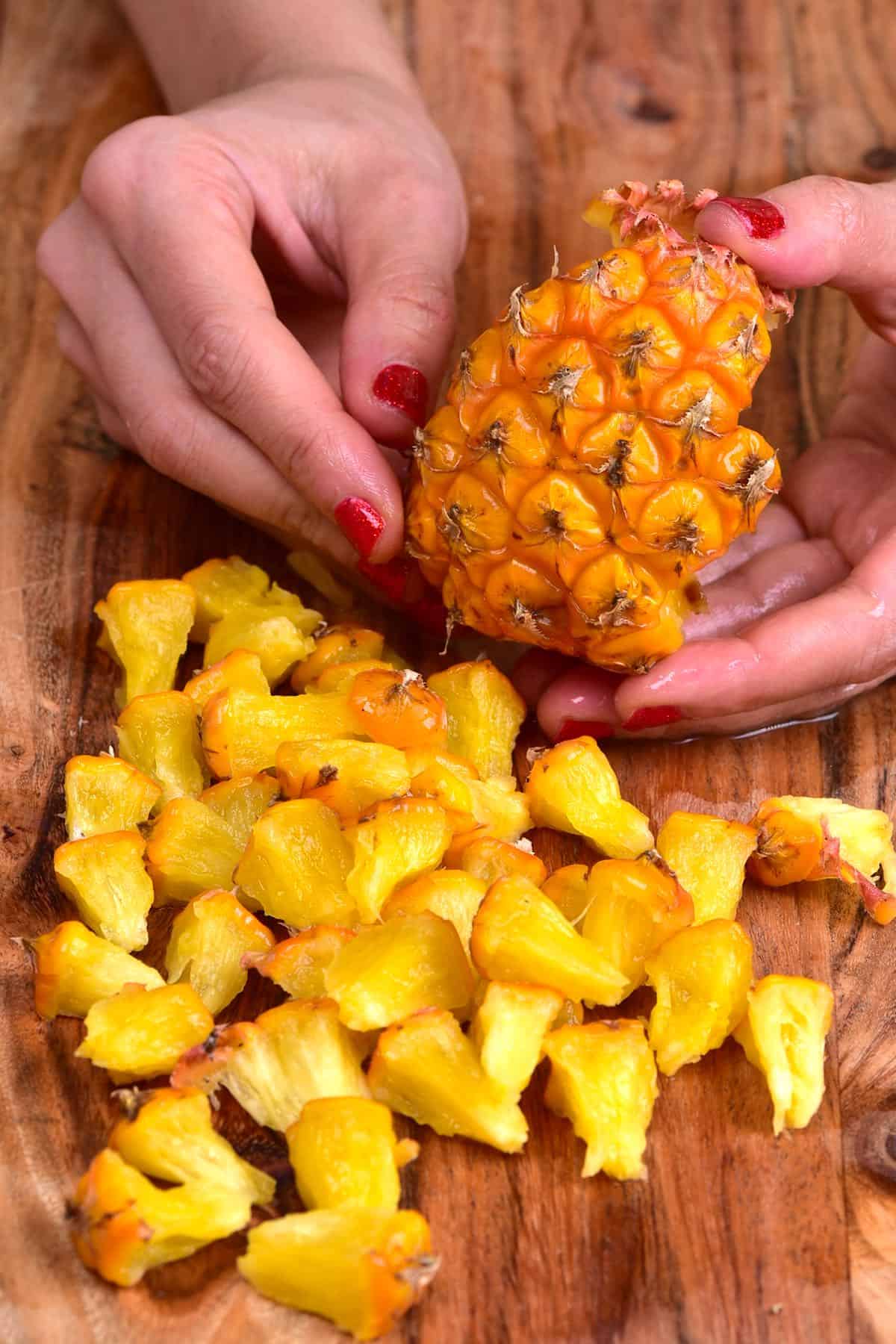 How To Cut A Pineapple (Pull Apart/ Peeling Pineapple Hack) Alphafoodie