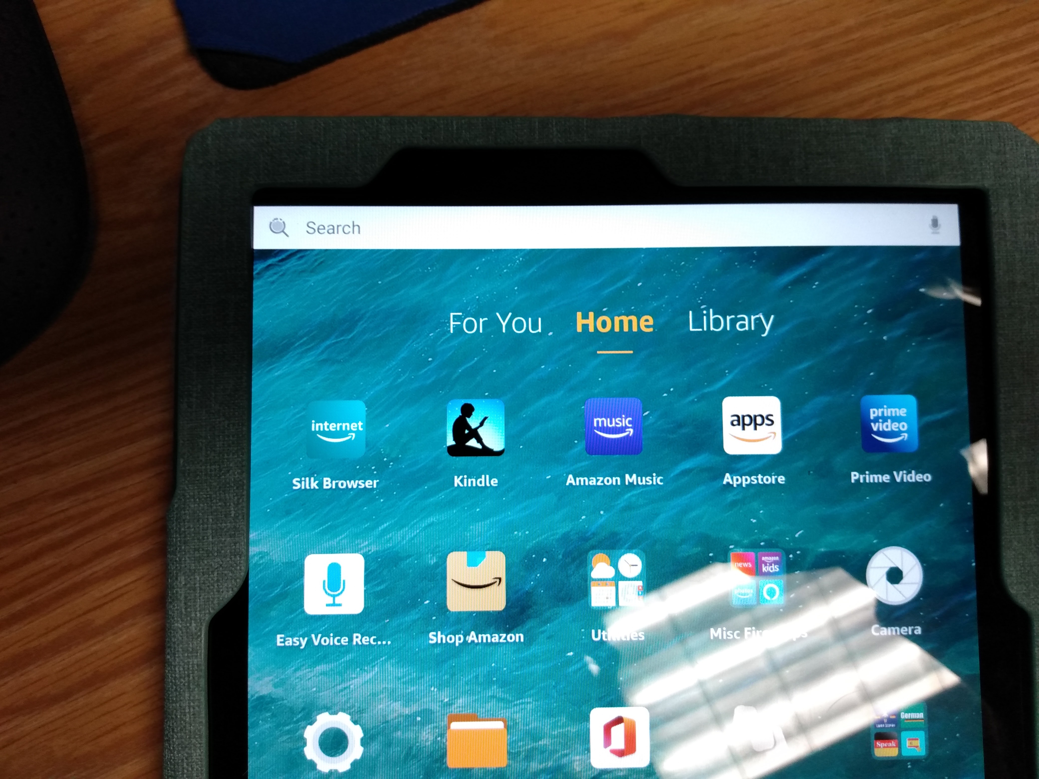 How do I get rid of the search bar that appears on Home Screen on Fire