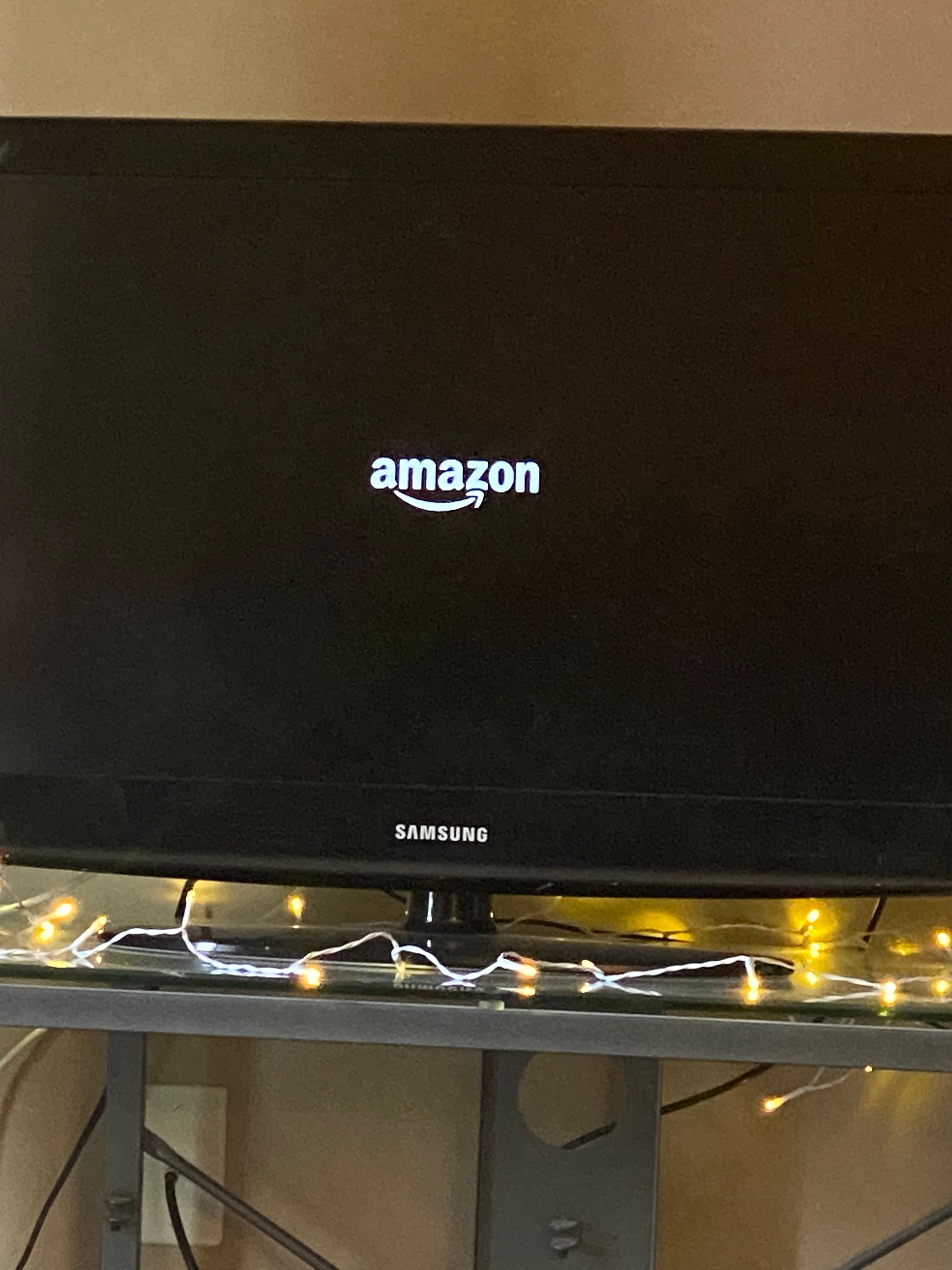 Why is my Fire TV Stick stuck on the Amazon logo screen?