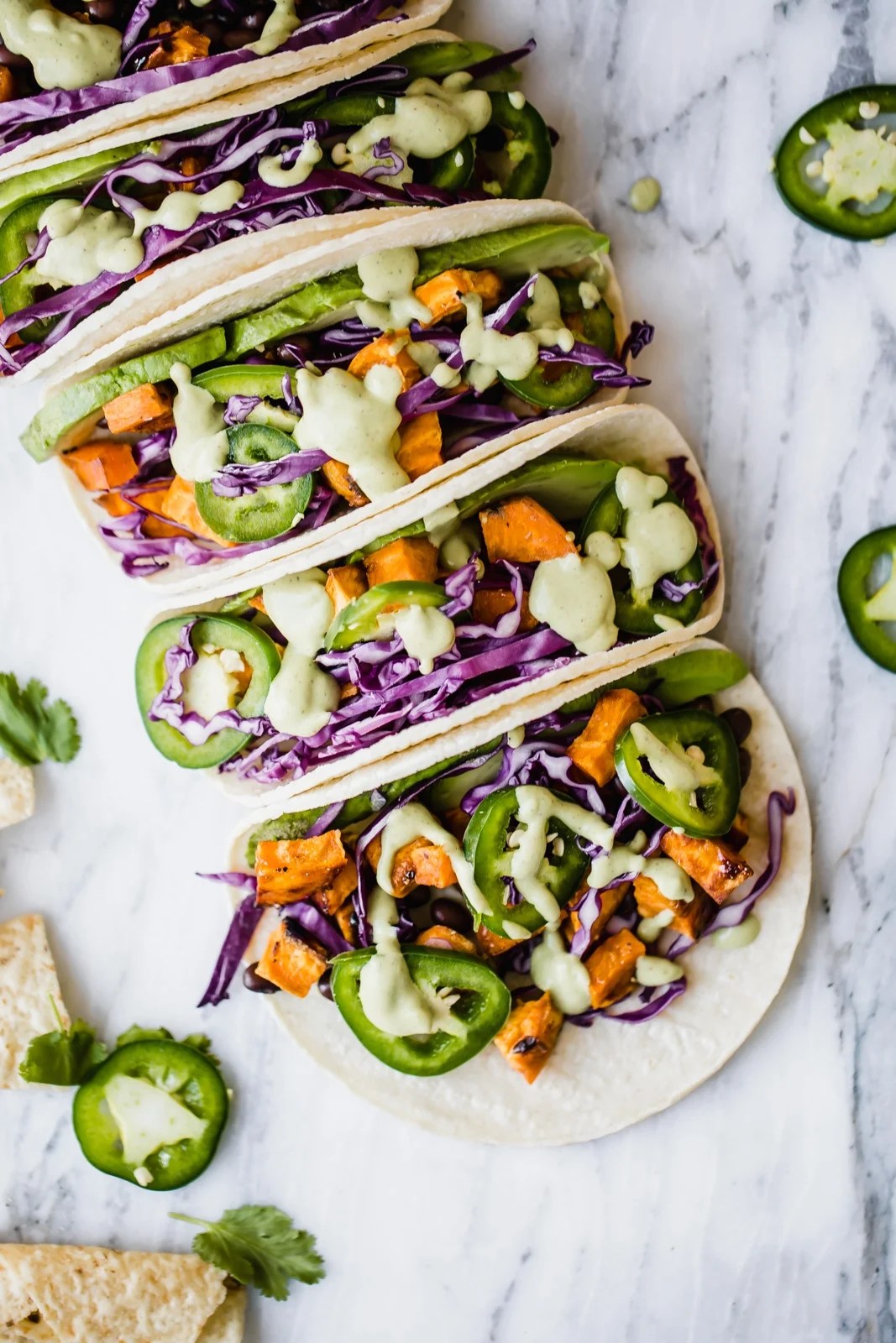 Jalapeño Sweet Potato Black Bean Tacos with AvocadoLime Crema