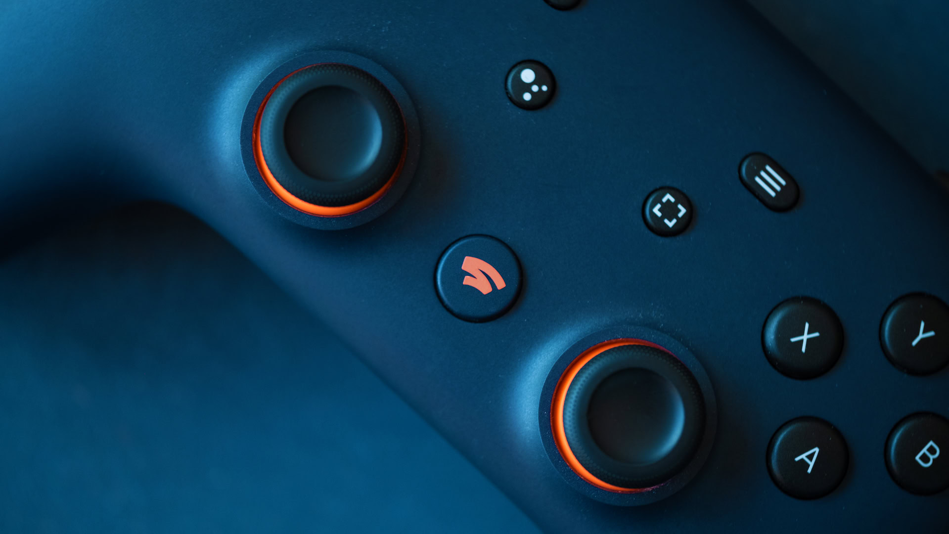 Google Stadia controller on table macro