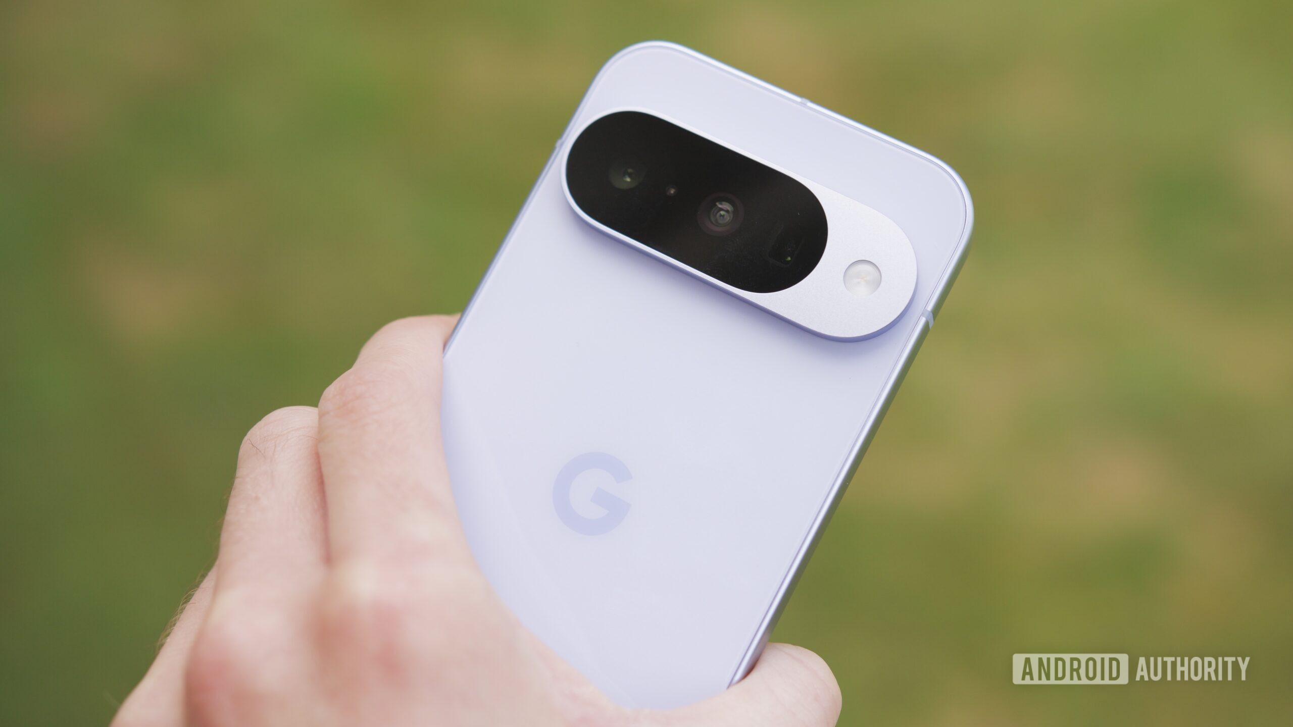 google pixel 10 camera close up 3 Someone holding the Google Pixel 10, showing the back of the phone.