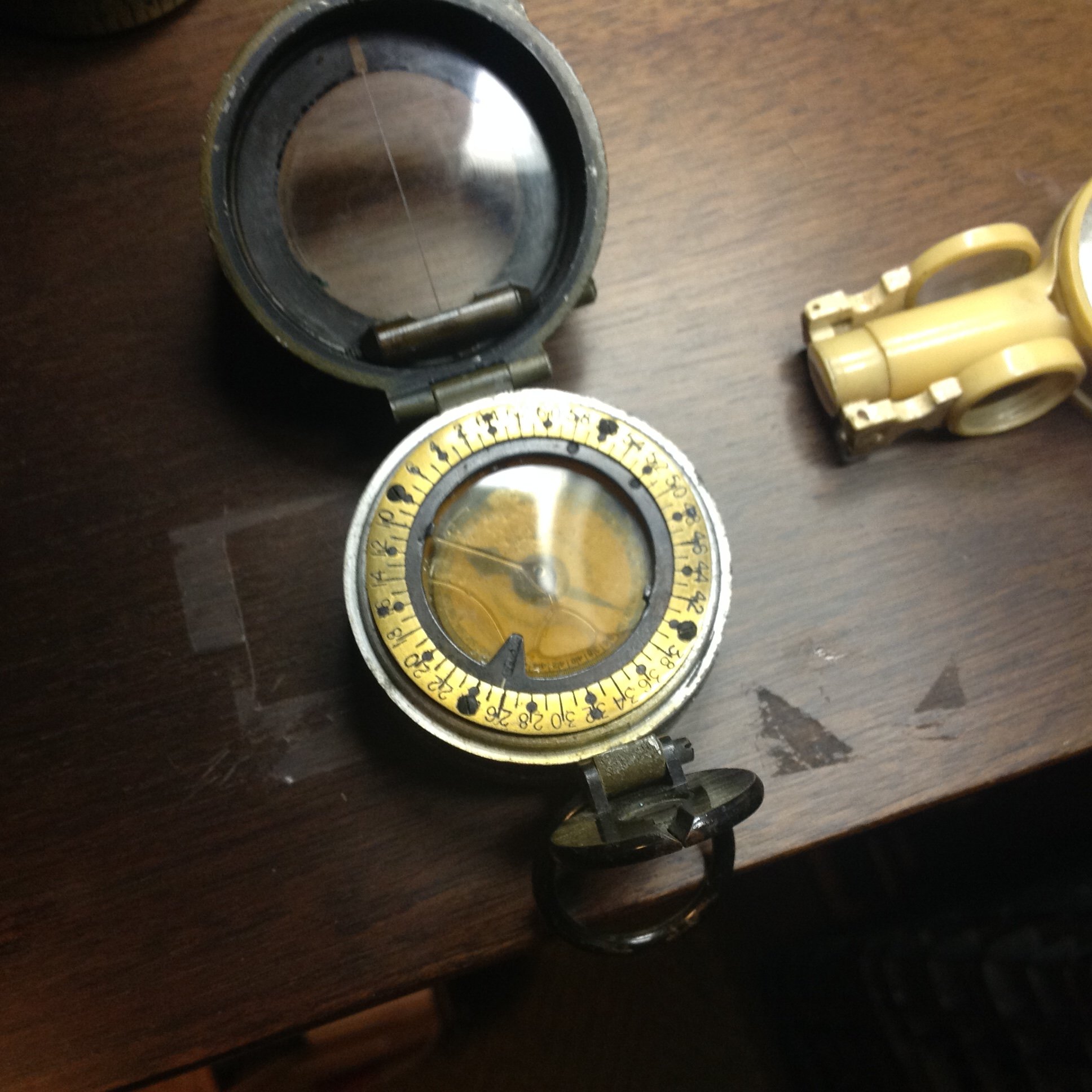 I need guidance on how to properly ID a compass collection Antiques Board