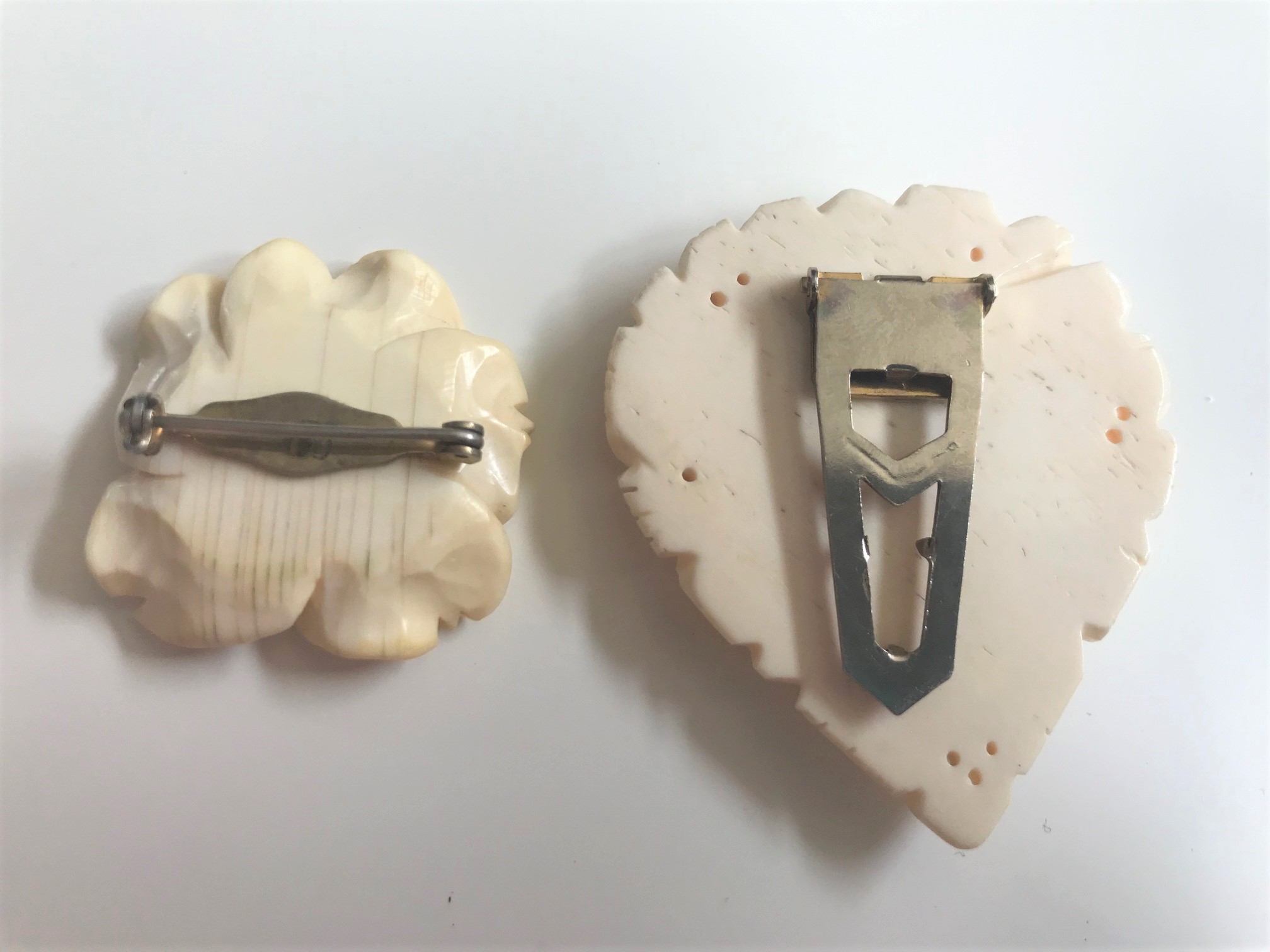 Ivory, bone? both glow under black light, help me learn! Antiques Board