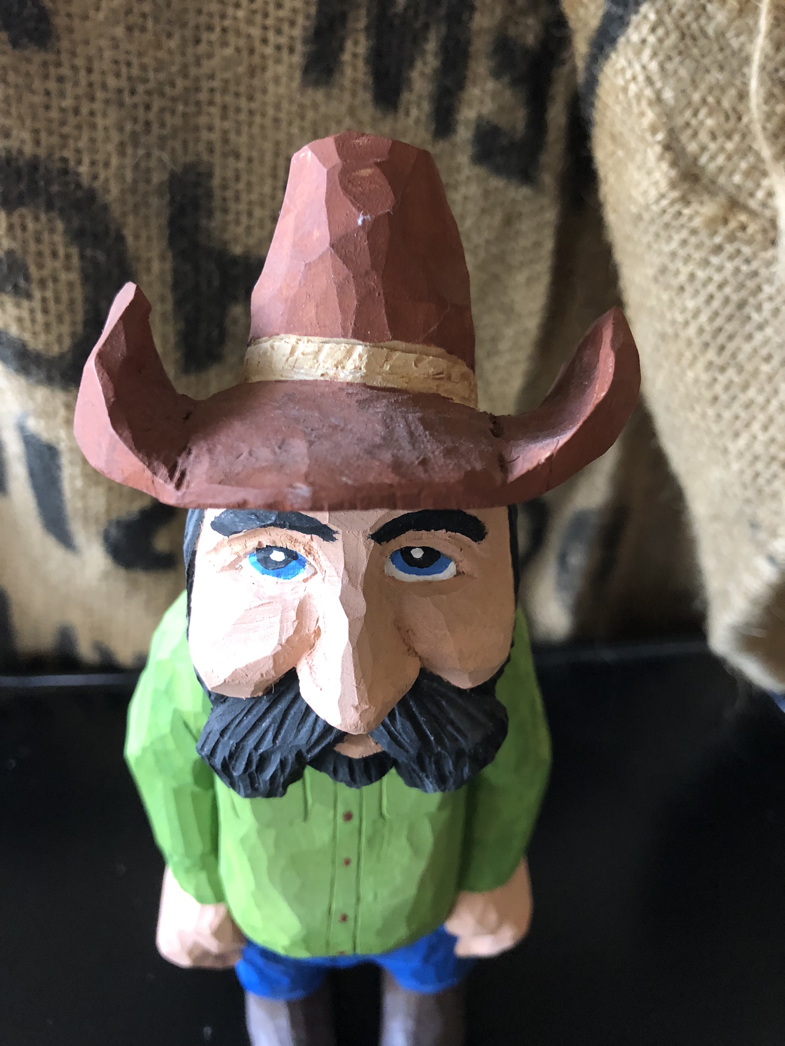Hand Carved and painted wood cowboy figure Antiques Board