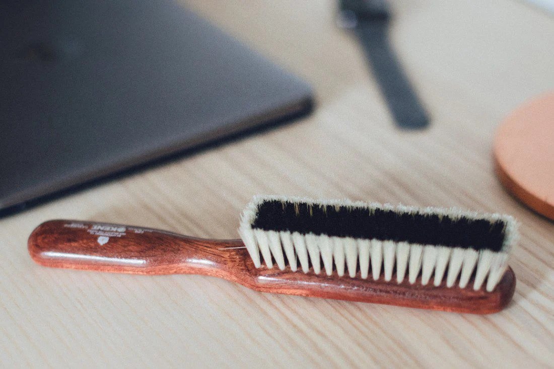 The Benefits of a Clothes Brush and How To Use One
