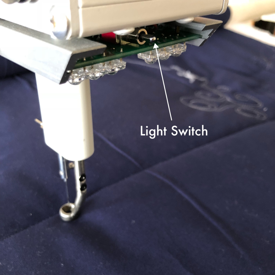 Machine quilting with black light APQS