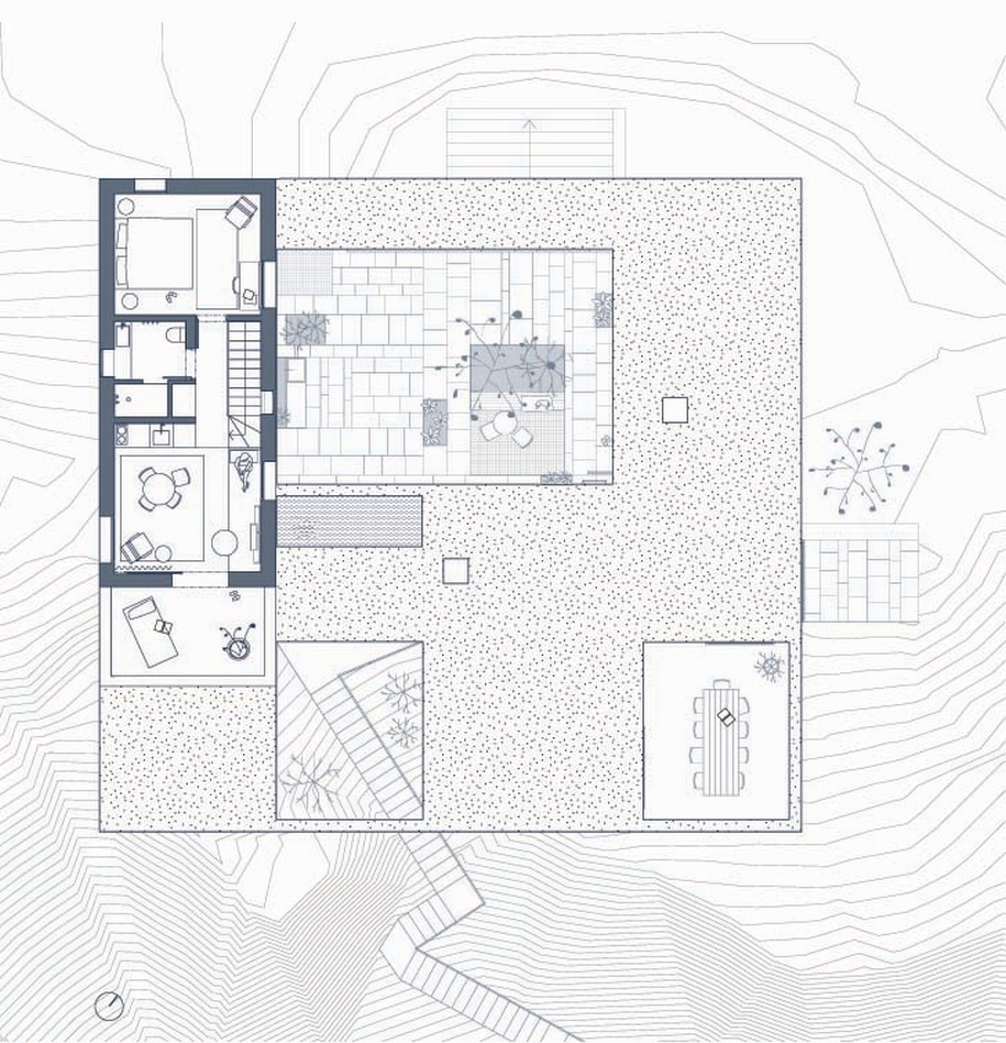 OOAK ARCHITECTS designed Patio House on a cliffside in Karpathos