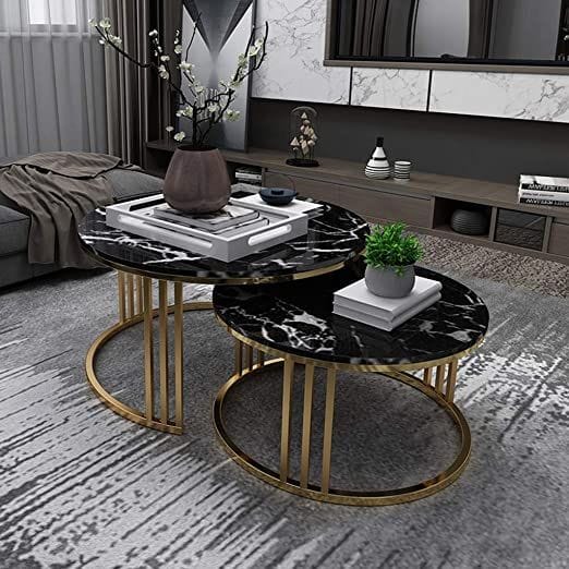 The Round Black Marble Table Is The Absolute Favorite