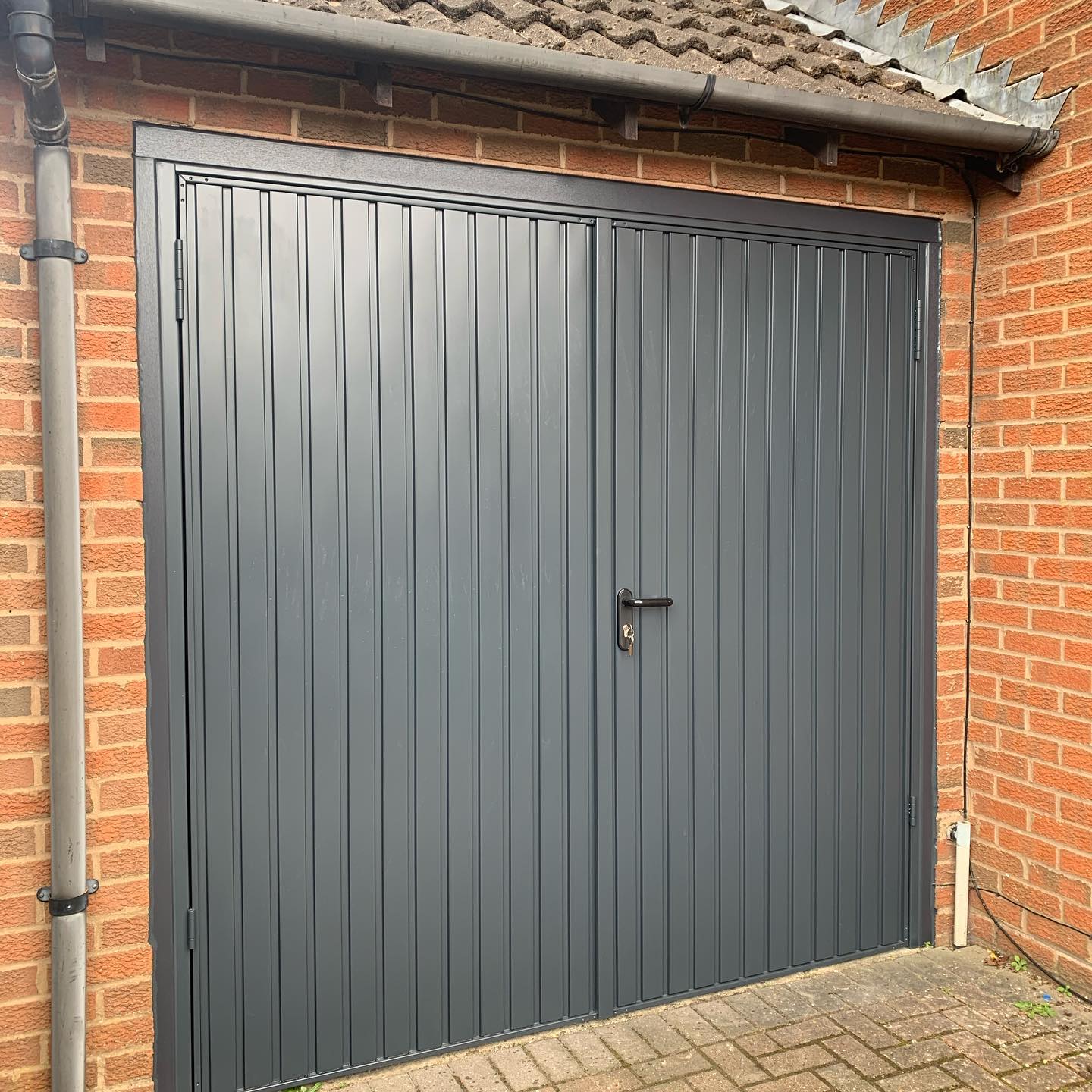 Side Hinged Garage Doors Thatcham in Steel, Timber and GRP