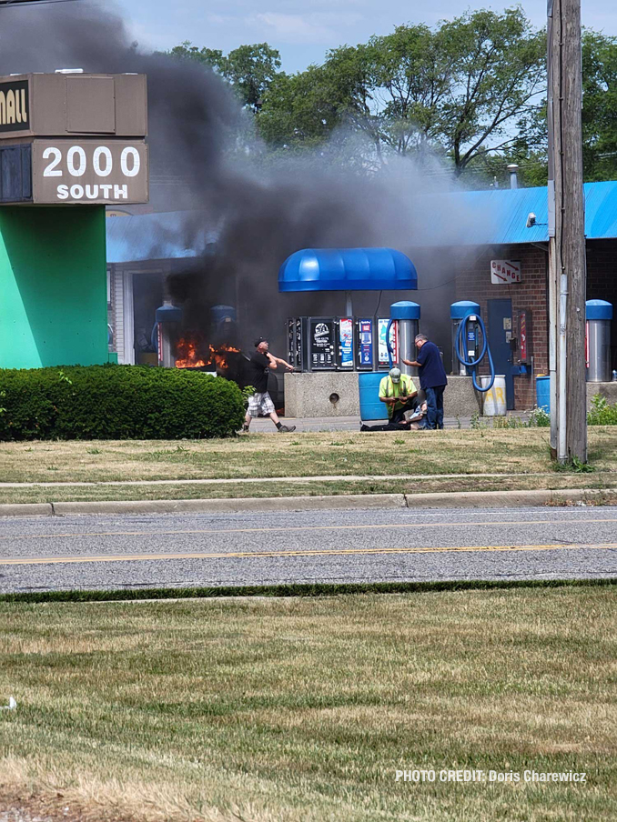 Good Samaritans Carry Man Away from Burning Car at Car Wash on Elmhurst Rd, Mount Prospect