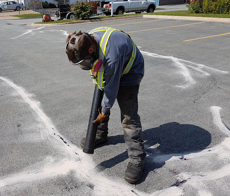 Scotia Asphalt Sealers, specializing in Hot Rubber Crack Filling