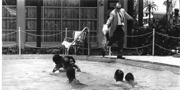 Motel manager pours acid in the pool while black people were swimming