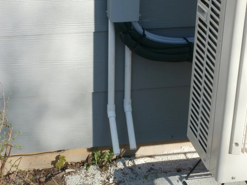 How Does a MiniSplit Drain From The Wall or Ceiling?