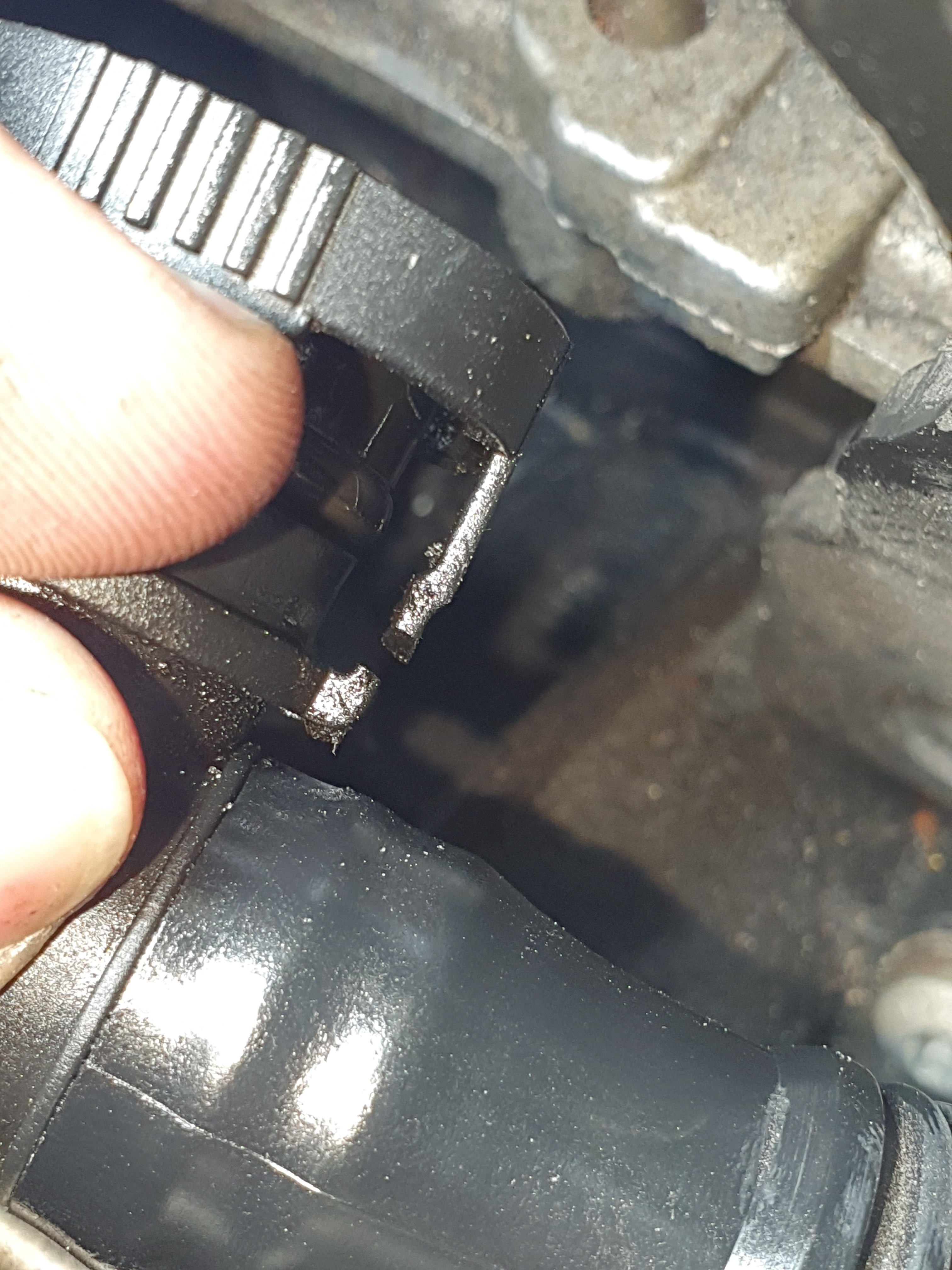 Broken PCV valve hose clip