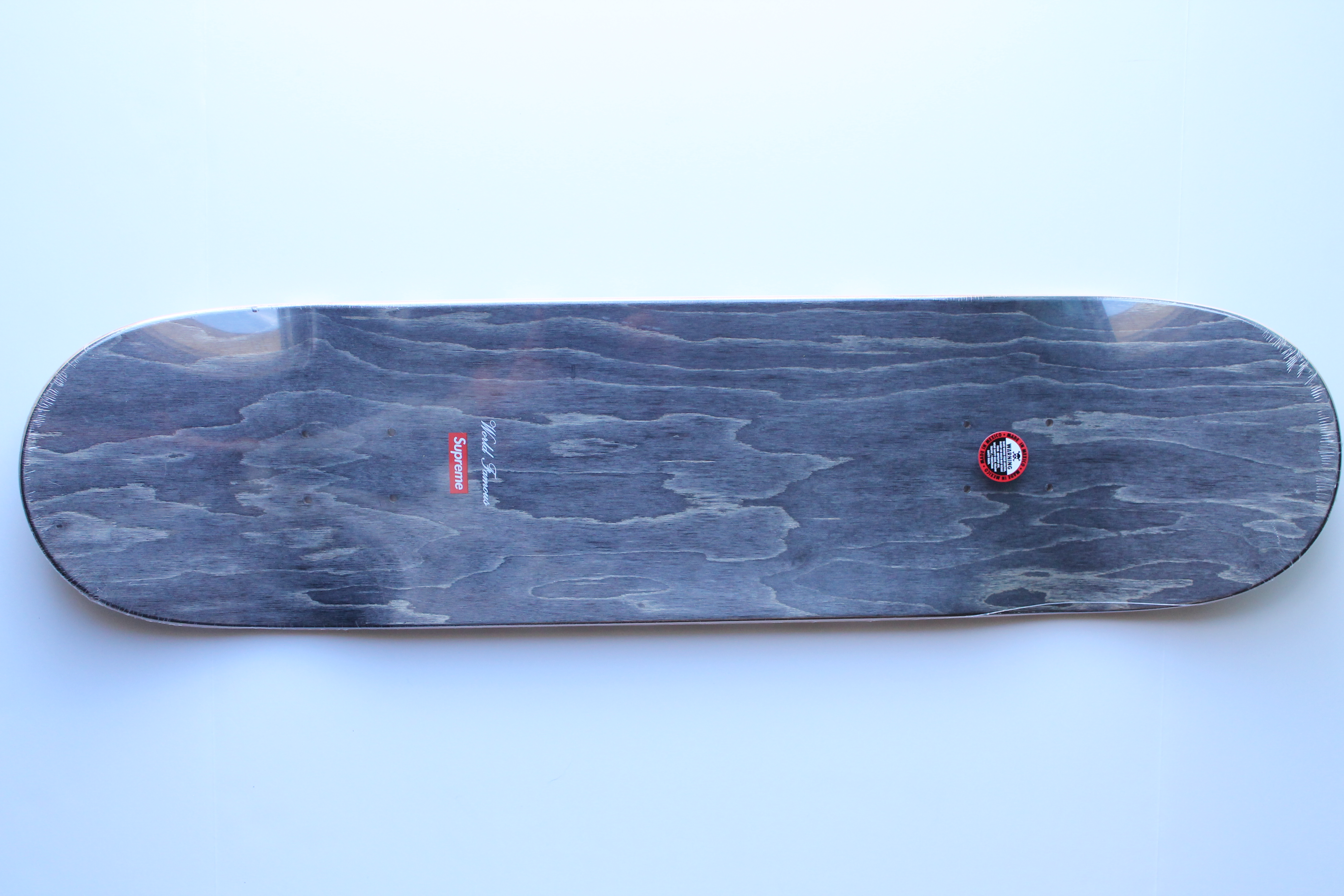 AuthentKicks Supreme illegal business controls America Skate Deck