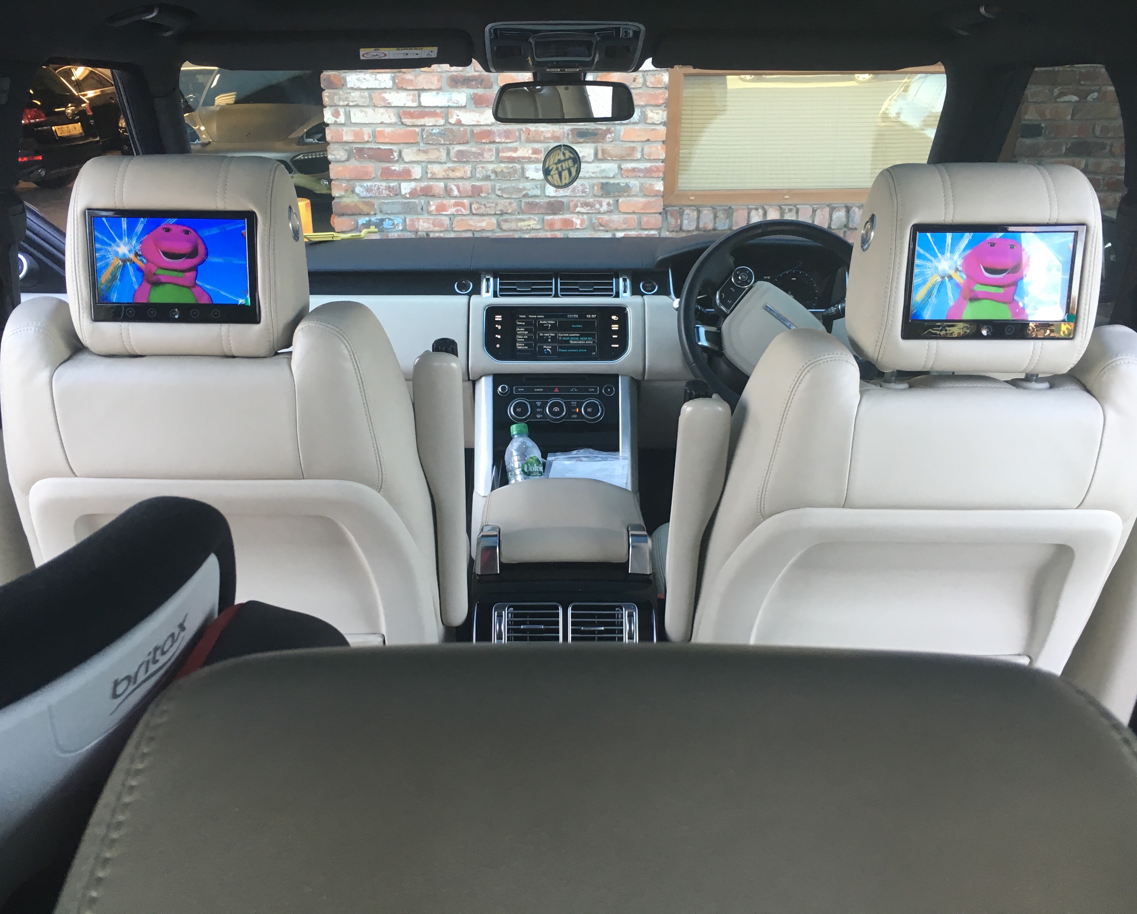 Headrest screen fitting Range Rover AV Solutions