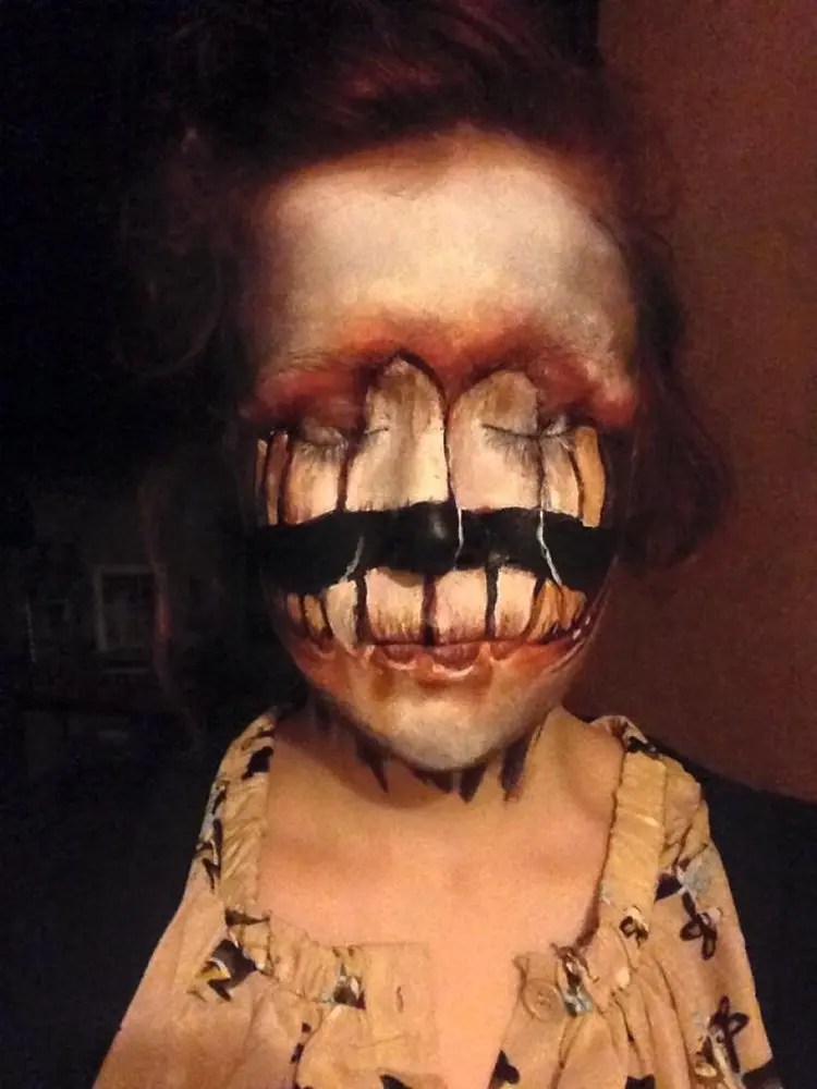 This Girl's Use Of Face Paints Is Both Creepy And Awesome