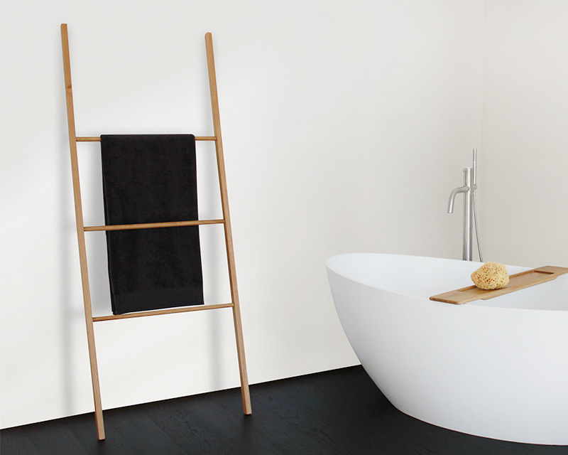 Elegant ladder in oak nature for bath towels and pieces of clothing