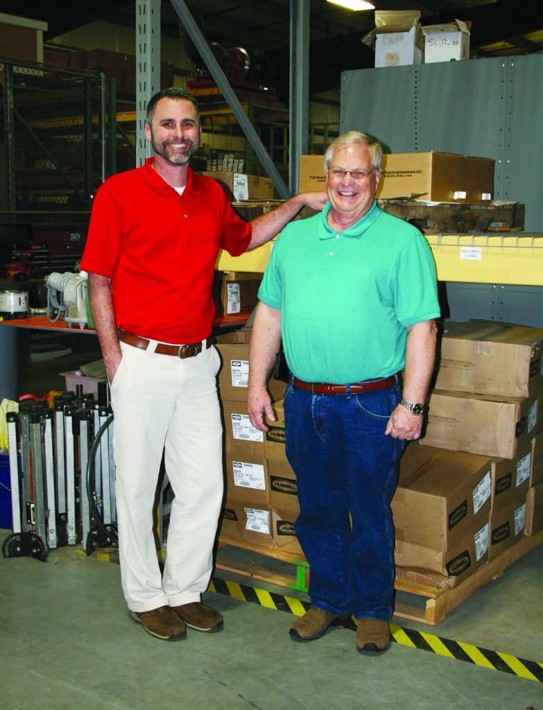 Baldwin EMC retiree Butch Long sits down with employee Tim Hobbs