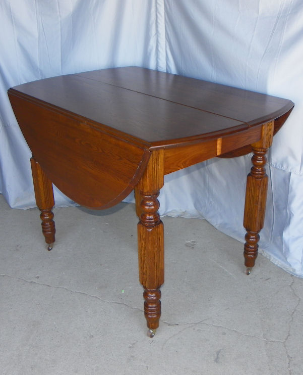 Bargain John's Antiques Antique Drop Leaf Table with four leaves