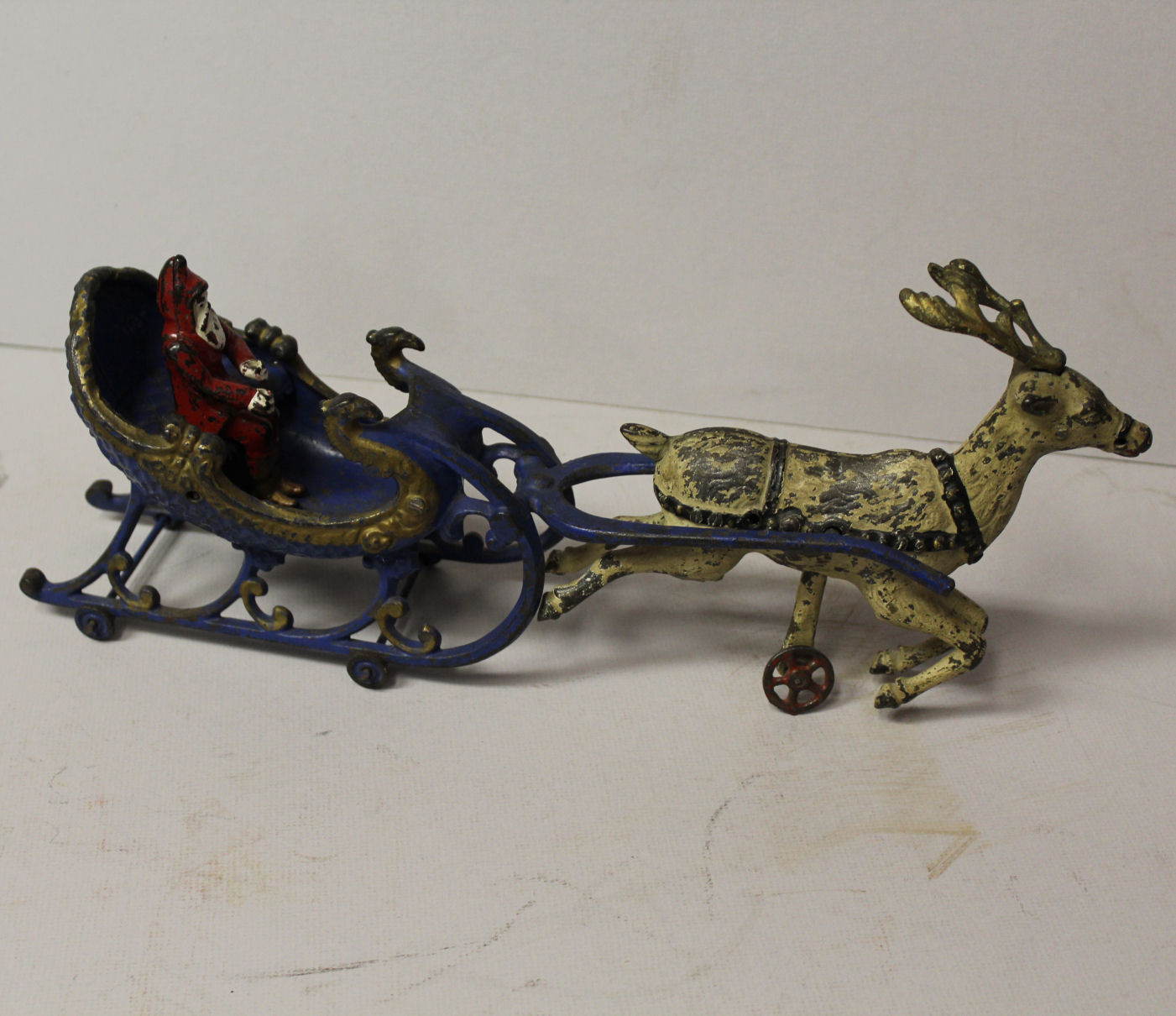 Bargain John's Antiques Cast Iron Santa Claus Sleigh and Reindeer Toy