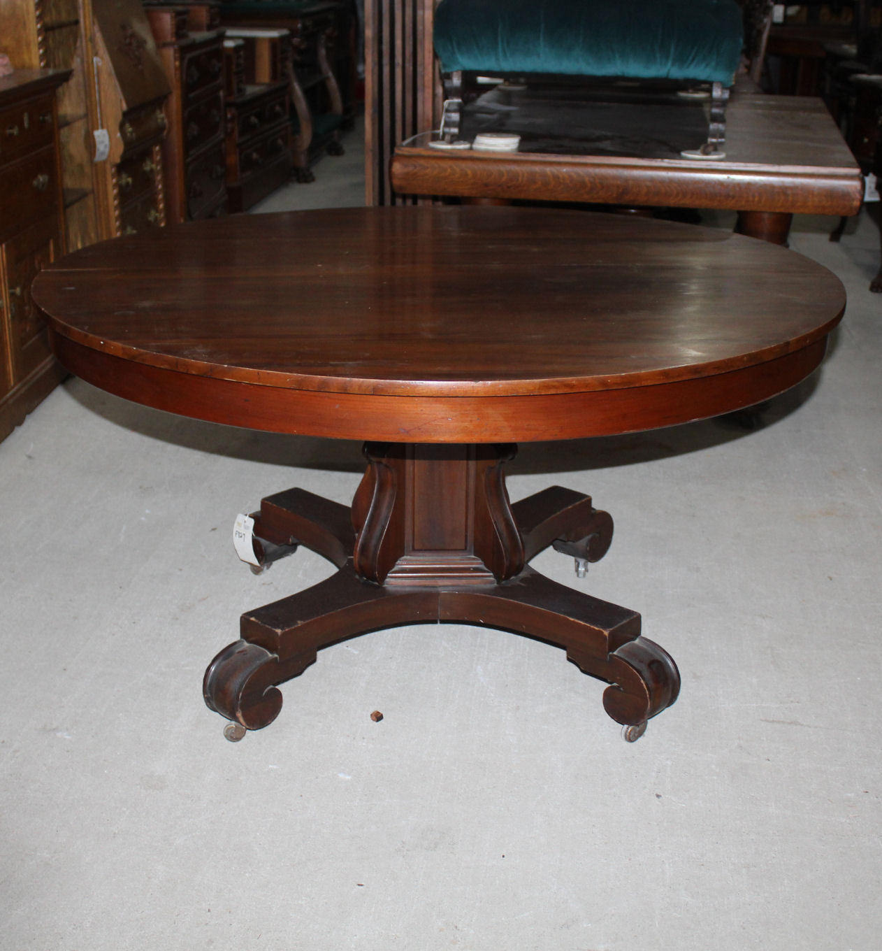Bargain John's Antiques Antique Round 54" Diameter Mahogany Dining Table with 5 Leaves