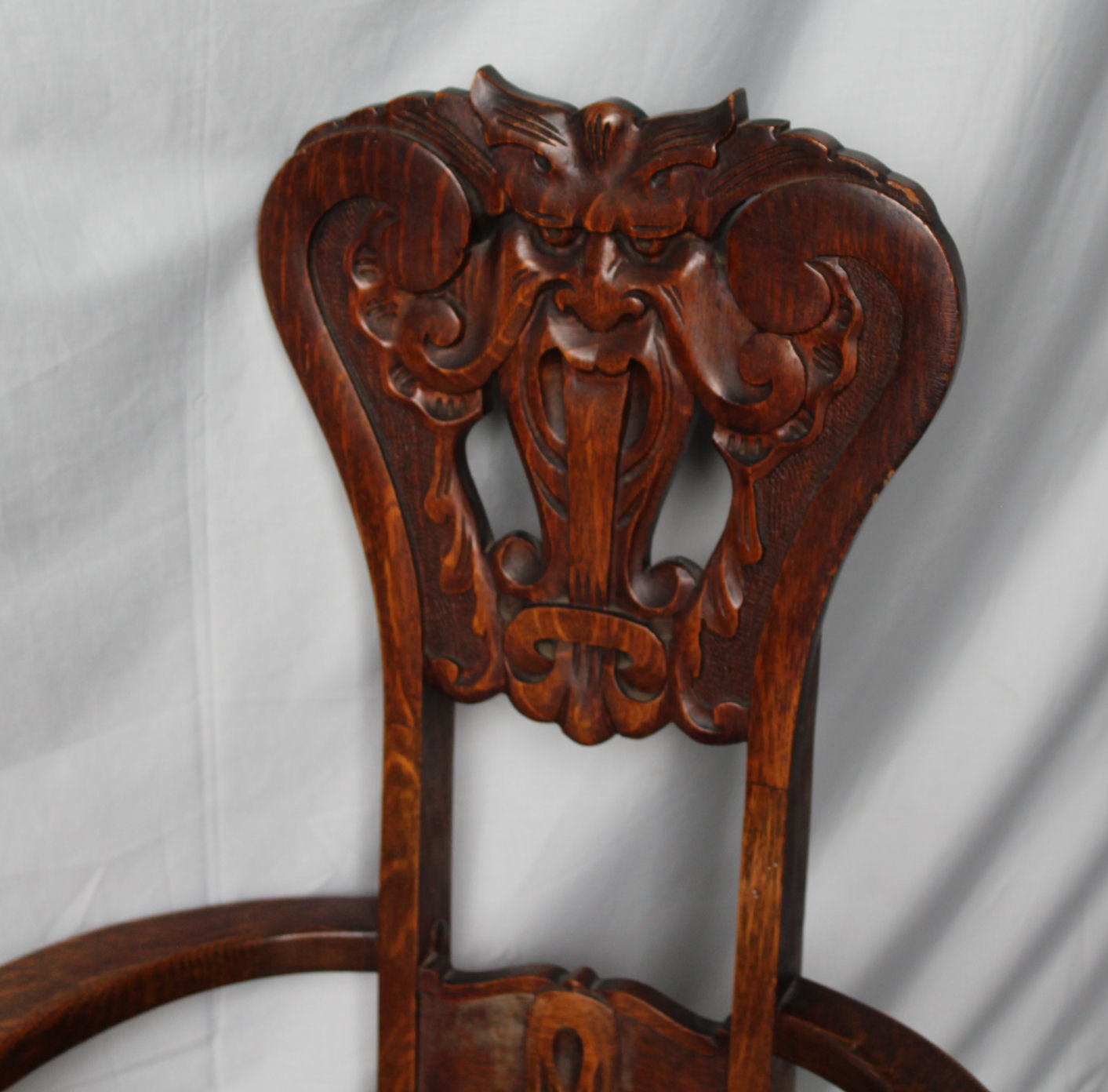 Bargain John's Antiques Antique Pair of Oak Chairs with carved face