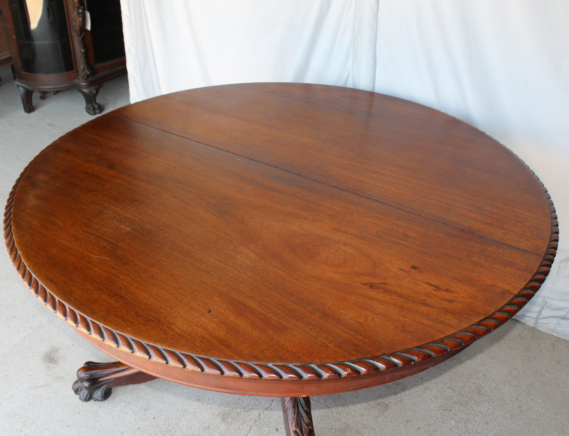 Bargain John's Antiques Antique Round 54 inch Mahogany Dining Table with 7 leaves Bargain