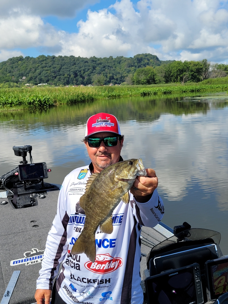 ster with a smallmouth Bassmaster
