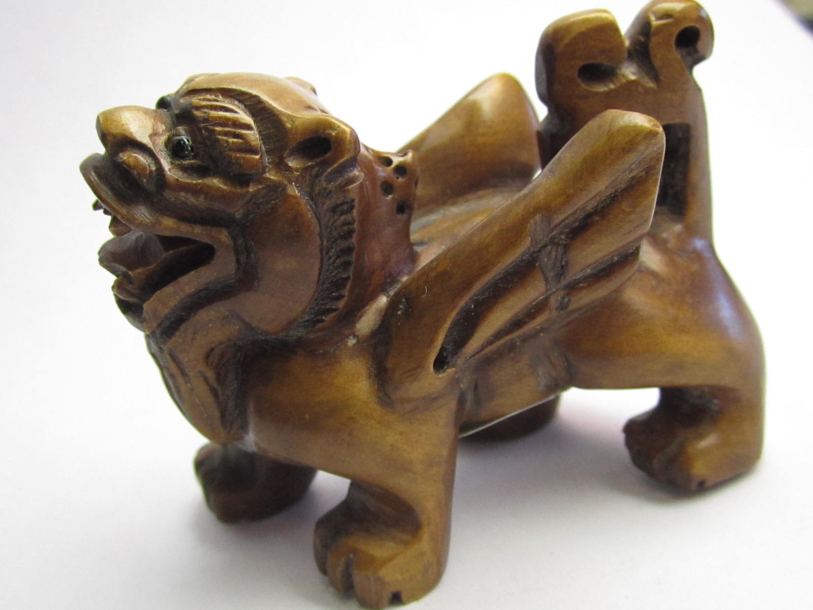 Small Wood Carving Winged Foo Dog Statue / Lion 2" tall