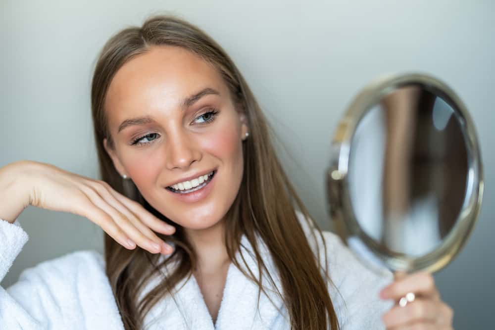 Why Do I Look Better In The Mirror? (10 Potential Reasons)