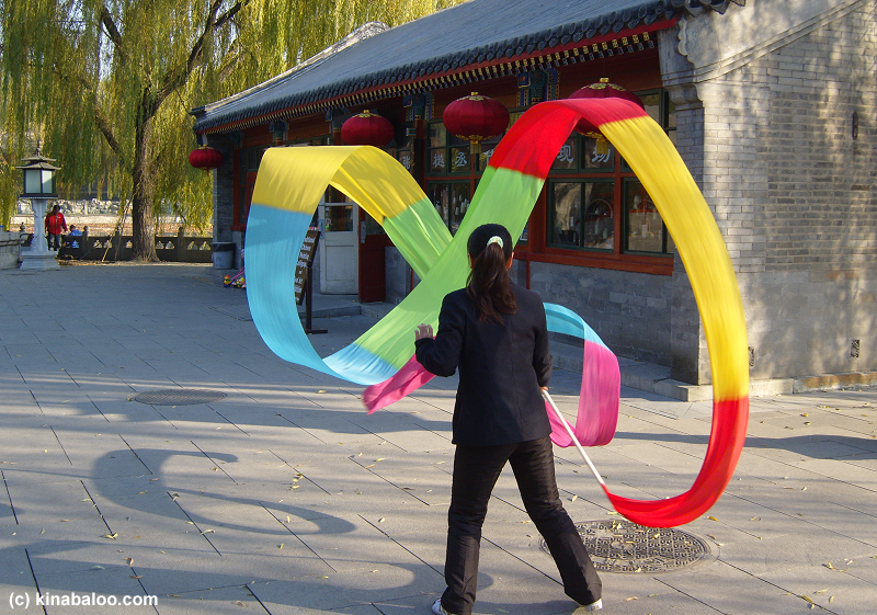 Photographs of ribbon dancing in Beihai Park, Beijing