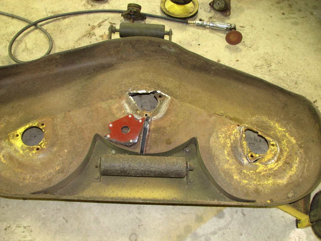Garage Repairing a John Deere 317 48" Mower Deck