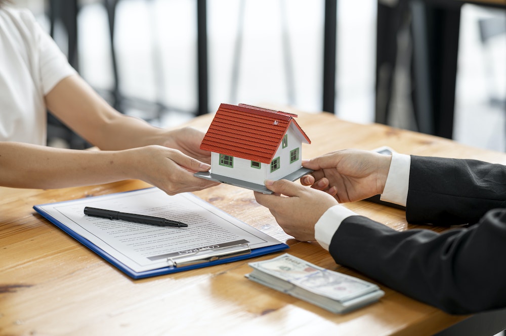 Tout savoir sur le Contrat d'Achat Immobilier Guide Juridique