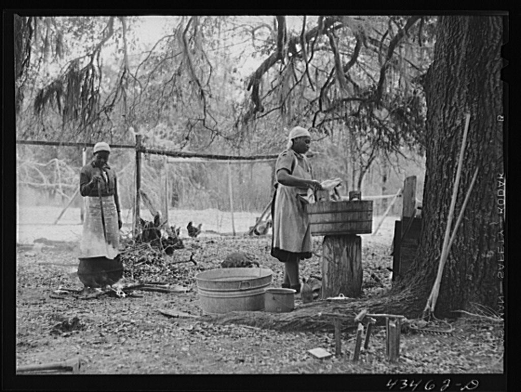 Pictured Family who had moved out of SanteeCooper Basin, washing