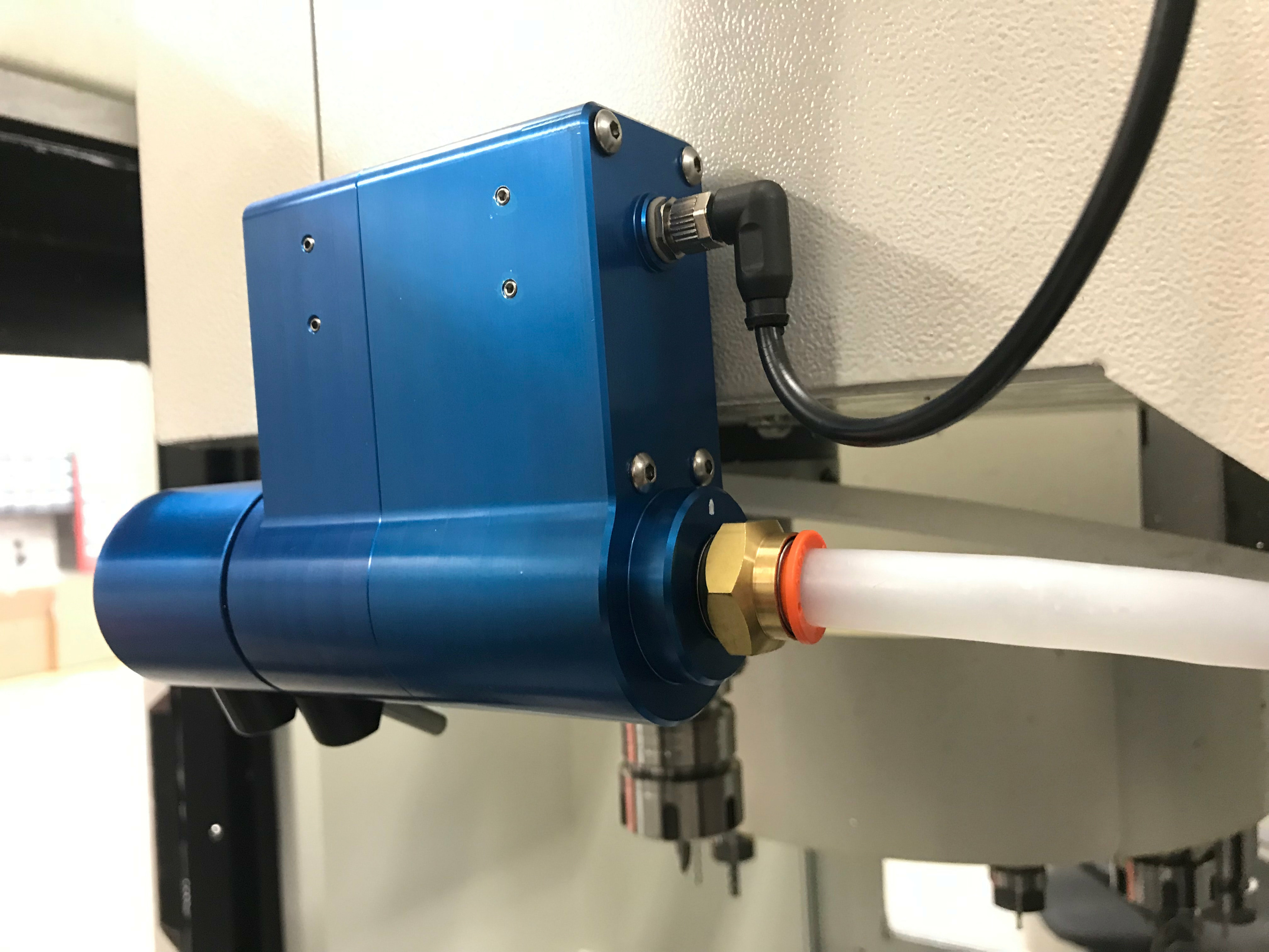 Accublast remote control CNC coolant nozzle