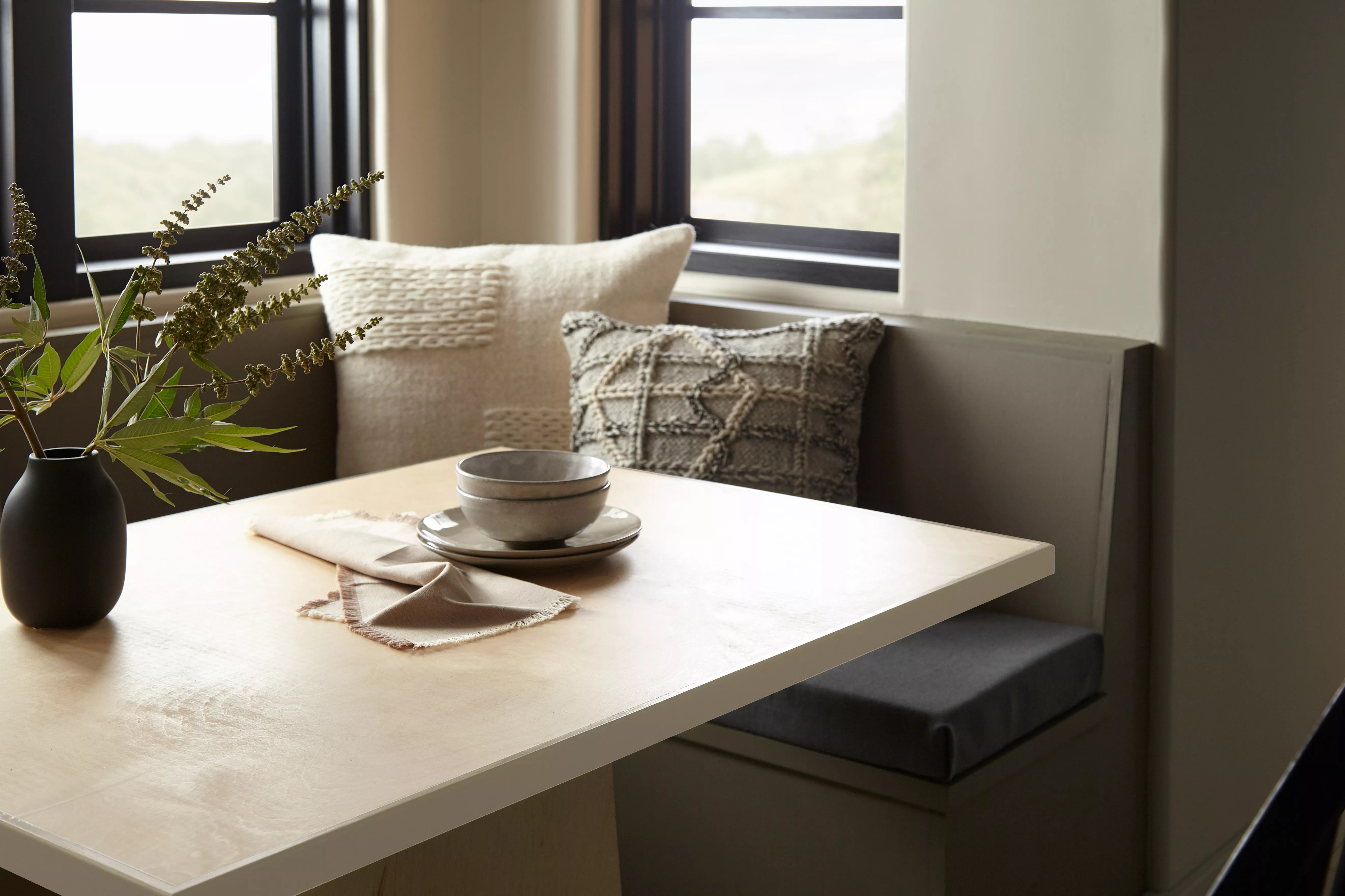 breakfast nook with gray walls