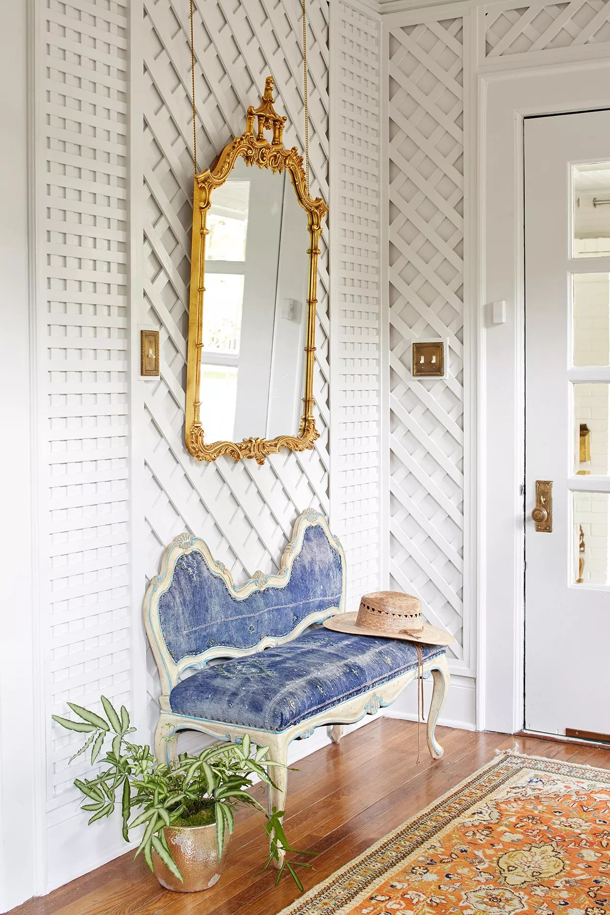 Mirror above entryway bench