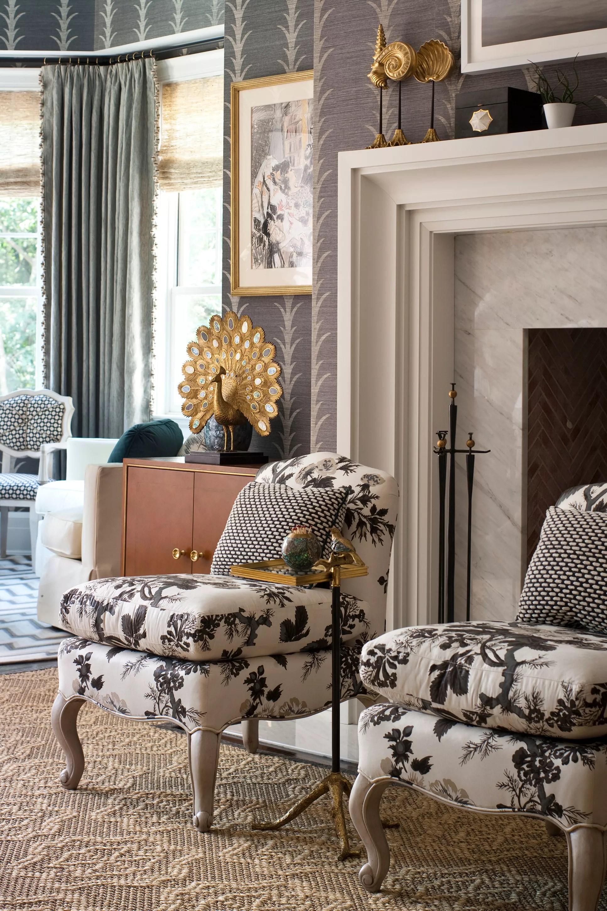 traditional living room with floral chairs