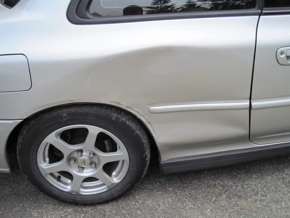 How to Take Out a Dent in a Quarter Panel – BigBery